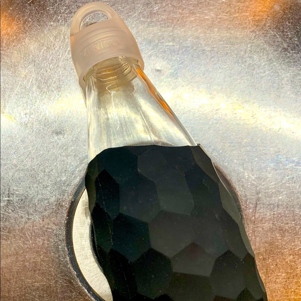 MINISO Glass Water Bottle with textured silicone sleeve